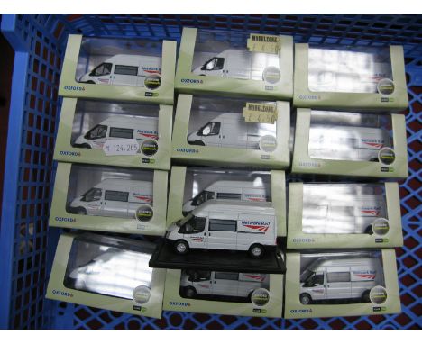 Thirteen Oxford 1:76th Scale Diecast Model Lineside Vehicles, Ford Transit vans, many with network rail liveries, nearly alwa