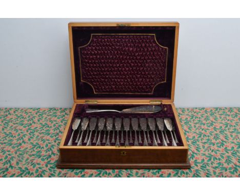 An Edwardian period silver plated fish eater service by Henry Wilkinson &amp; Co, the nicely engraved setting for twelve in f