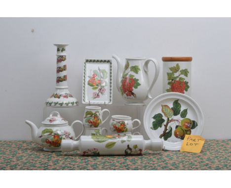 A large collection of Portmeirion floral tablewares, including plates, candlesticks, teapot, rolling pin, storgae jars, etc A