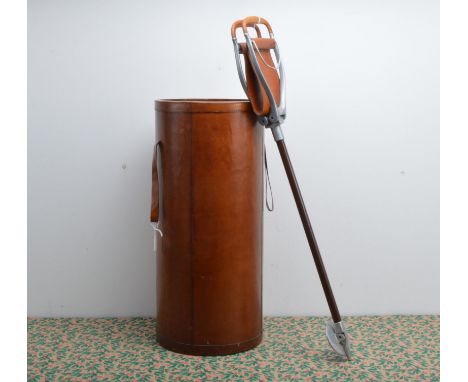 A nice modern tan leather umbrella stand and a shooting stick, 62cm high and with two strap handles and drip pan, together wi