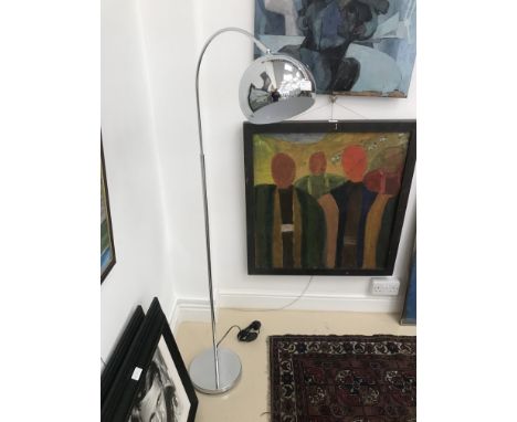 A chrome floor lamp
