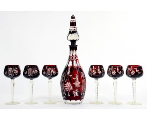 A RUBY FLASHED GLASS DECANTER AND STOPPER, 44CM H AND A SET OF SIX WINE GLASSES, 20TH CENTURY