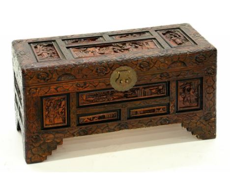 A CHINESE CARVED CAMPHOR WOOD TRUNK, 70CM W