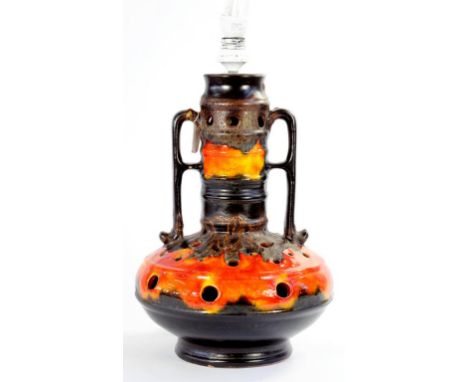 A 1960S WEST GERMAN EARTHENWARE LAMP OF BOTTLE SHAPE WITH MOTTLED ORANGE 'LAVA' GLAZE, 47CM H