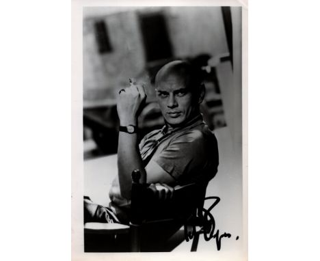 Yul Brynner signed 7x5 vintage black and white photo. Yul Brynner was a Russian, French, Swiss, and American actor, singer, a
