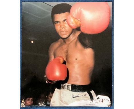 Muhammad Ali signed 18x16 colour photo a little damage on bottom of print signature not affected. Good condition. All autogra