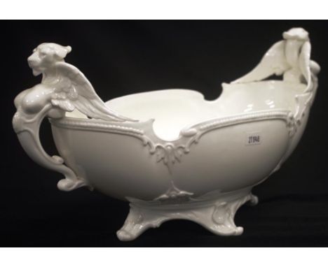 Royal Worcester Blanc De Chine footed centre piece decorated with mystical beast handles to both sides, width 38cm approx