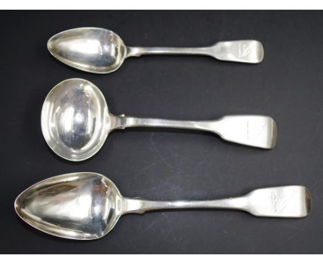 Three various Georgian sterling silver spoons including: London 1825, dessert spoon, and sauce ladle, each with maker's name 