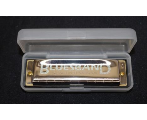 Hohner 'Bluesband' harmonica in fitted case, (width 10cm approx).