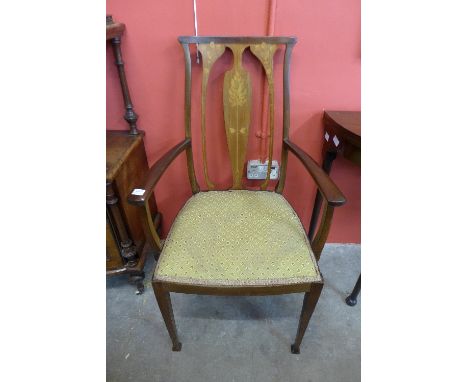 An Art Nouveau inlaid mahogany elbow chair