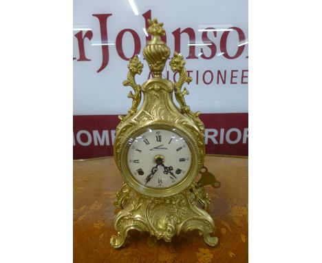 An Italian gilt metal mantel clock