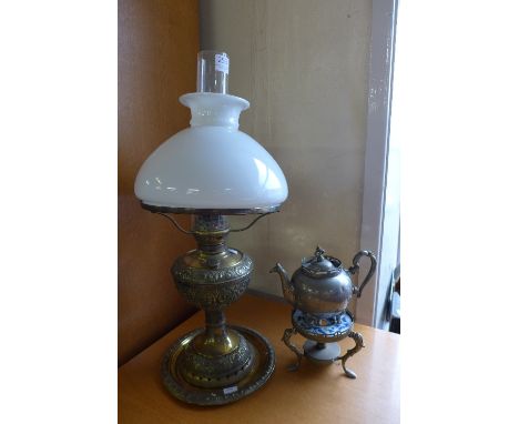 A Victorian brass oil lamp and an early 20th Century Dutch spirit kettle on stand, J.N. Daalderop, Royal Haooland pewter