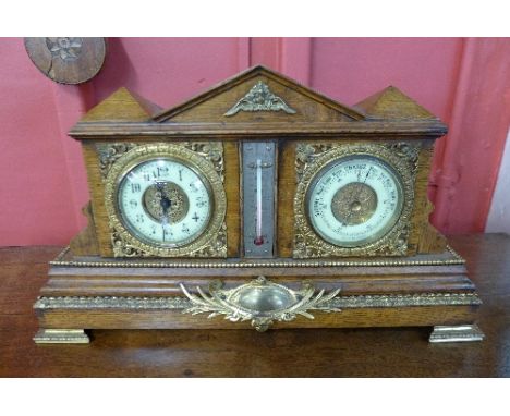 A late 19th Century French oak and ormolu mounted architectural cased clock, barometer and thermometer