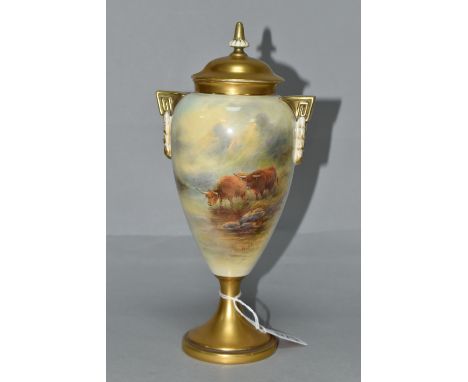 A ROYAL WORCESTER TWIN HANDLED OVOID PEDESTAL VASE AND COVER HAND PAINTED WITH TWO HIGHLAND CATTLE WATERING BY JOHN STINTON, 