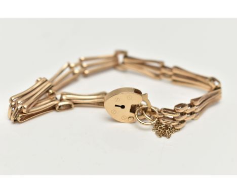 A 9CT GOLD GATE BRACELET, yellow gold bracelet, fitted with a heart padlock clasp, hallmarked 9ct Sheffield, approximate gros