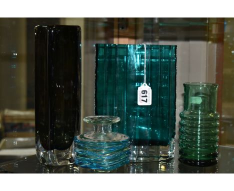 FOUR PIECES OF COLOURED STUDIO GLASS, comprising a navette shaped teal coloured vase with fluted ribs probably by Alstebro, u