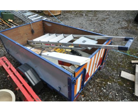 A SINGLE AXLE BOX TRAILER, with tail boards and cables, along with an aluminium step ladder (condition report: -both tyres fl