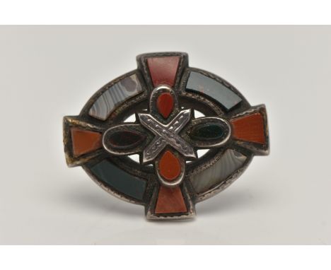 A SCOTTISH HARDSTONE BROOCH, of an oval form set with various hardstones and agate, in a white metal mount, unmarked, fitted 