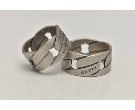 TWO 'GUCCI' WIDE CURB LINK BAND RINGS, each signed 'Gucci' stamped 925 Swiss control marks, ring size centre X, and centre Q,