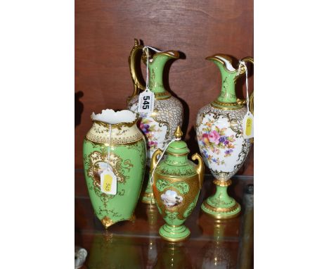 FOUR EARLY 20TH CENTURY COALPORT GREEN AND GILT GROUND EWERS AND VASES, comprising a pair of pedestal ewers of baluster form,