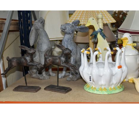 A COLLECTION OF DUCK THEMED ORNAMENTS, comprising two pairs if hare ornaments, a duck kitchen roll holder, planter, string ho