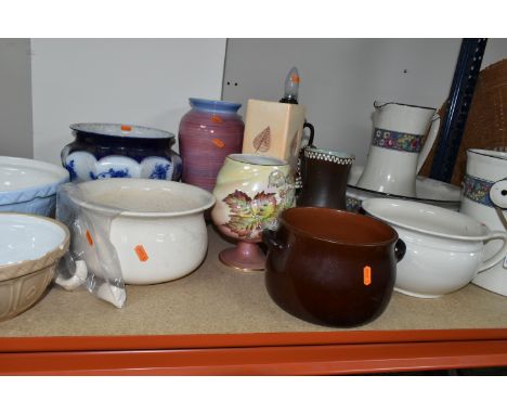 A GROUP OF CERAMIC PLANTERS AND CHAMBER POTS, to include a French  wash set of chamber pot, wash jug and bowl with a blue flo