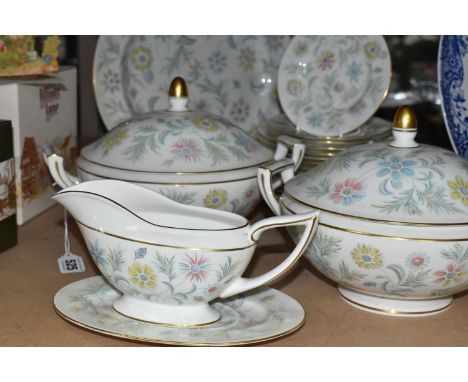 A TWENTY PIECE MINTON VANESSA PART DINNER SERVICE, comprising two tureens, a meat plate, a sauceboat (cracked) and stand, six