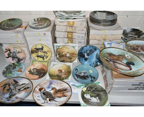 FIVE SETS OF BOXED RIVER AND WILDLIFE THEMED COLLECTOR'S PLATES, comprising four oval plates by the Council For Bird Preserva