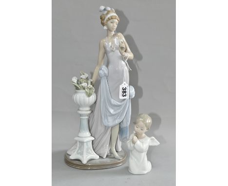 TWO LLADRO FIGURES, comprising 5377 'A Touch Of Class' (nibbles and chips to lilies), and an 'Angel Praying' (chipped hands a