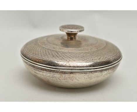 A SILVER LIDDED POT, of a circular form, engine turned pattern with round finial, brown plastic lining, hallmarked to the bas