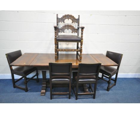 A REPRODUCTION OAK TRESTLE DRAW LEAF DINING TABLE, on square tapered legs, with foliate detailing, open length 208cm x closed