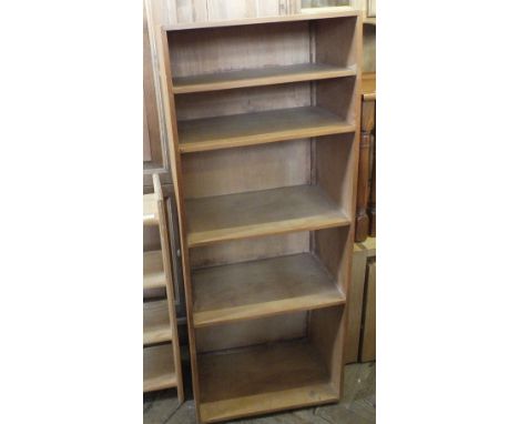 A modern pine five shelf bookcase