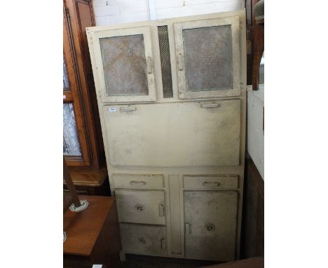 A vintage cream painted kitchen cabinet with enamel fall front
