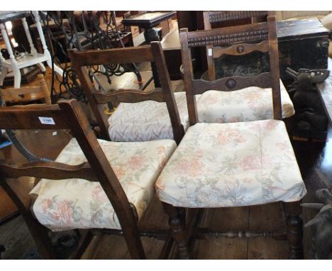 A set of four oak chairs and a commode