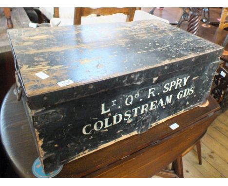 A pine box with inscription reading "Lt. Qm. R. Spry, Coldstream Gds" 