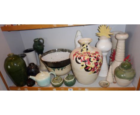 Shelf of contemporary Studio Pottery bowls, vases etc