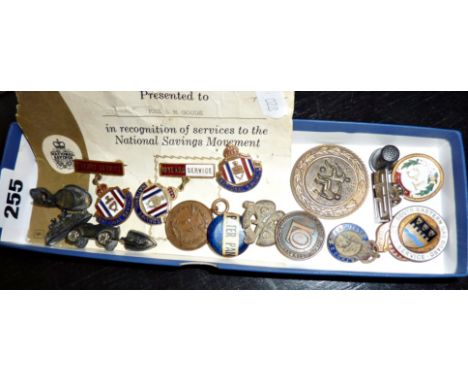 Box containing enamel and other badges, vintage Monopoly playing pieces etc.
