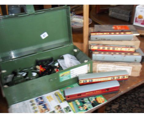 Trix Twin Railway Track sets (boxed) with manual and Hornby carriages (6), and a Blockmen Military Building System in case