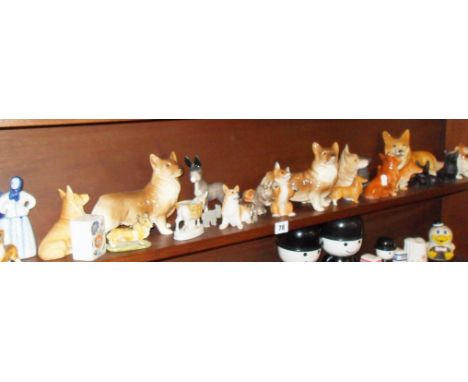 Shelf of Corgi and donkey figurines (some Beswick)