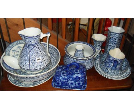 Shelf of blue & white china including washbowl, jug and chamber pot set, bowls, vases etc