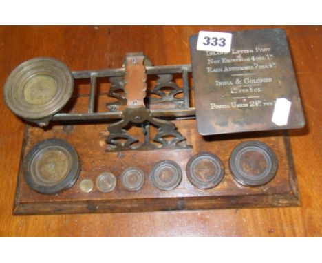 Victorian brass letter scales with weights on oak stand by Sampson Mordan