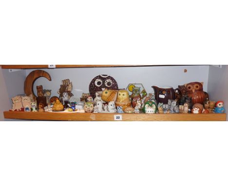 Collection of owl figurines (one shelf)