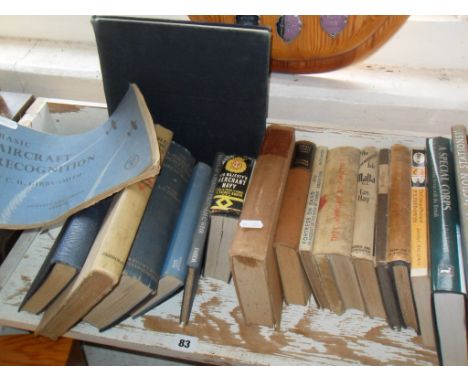 Shelf of mainly military aircraft and naval books