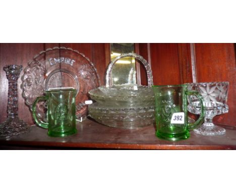 Shelf of commemorative pressed glass