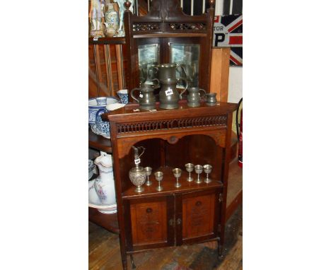 Victorian mahogany corner cabinet with carved detailing, and similar mirrored corner wall shelf