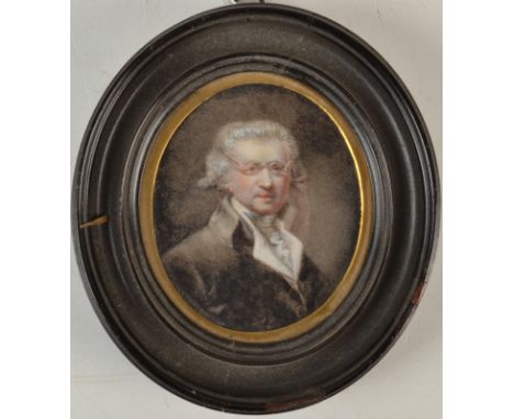 A portrait miniature of a gentleman with powdered wig and spectacles, 8 x 7cm   Condition Report: No cracks or warping. Gener
