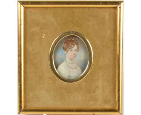 A Regency portrait miniature of a lady, her hair in ringlets, she wears a double strand pearl necklace, 6.5 x 5cm   Condition