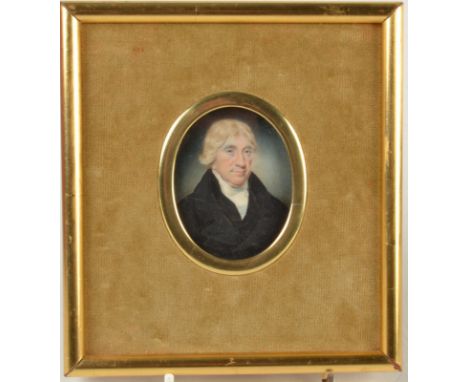 A George III portrait miniature of a gentleman in a blue coat, 6.5 x 5cm   Condition Report: No cracks or warping. 2 areas of
