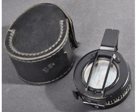 A WWII Second World War British Army issue 1944 dated ' EAC MKIII ' soldier's marching compass. Black, with lift-up glass vie