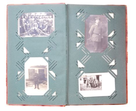 A WWI First World War German postcard album filled with 60+ assorted real photographic and other type picture postcards. Incl